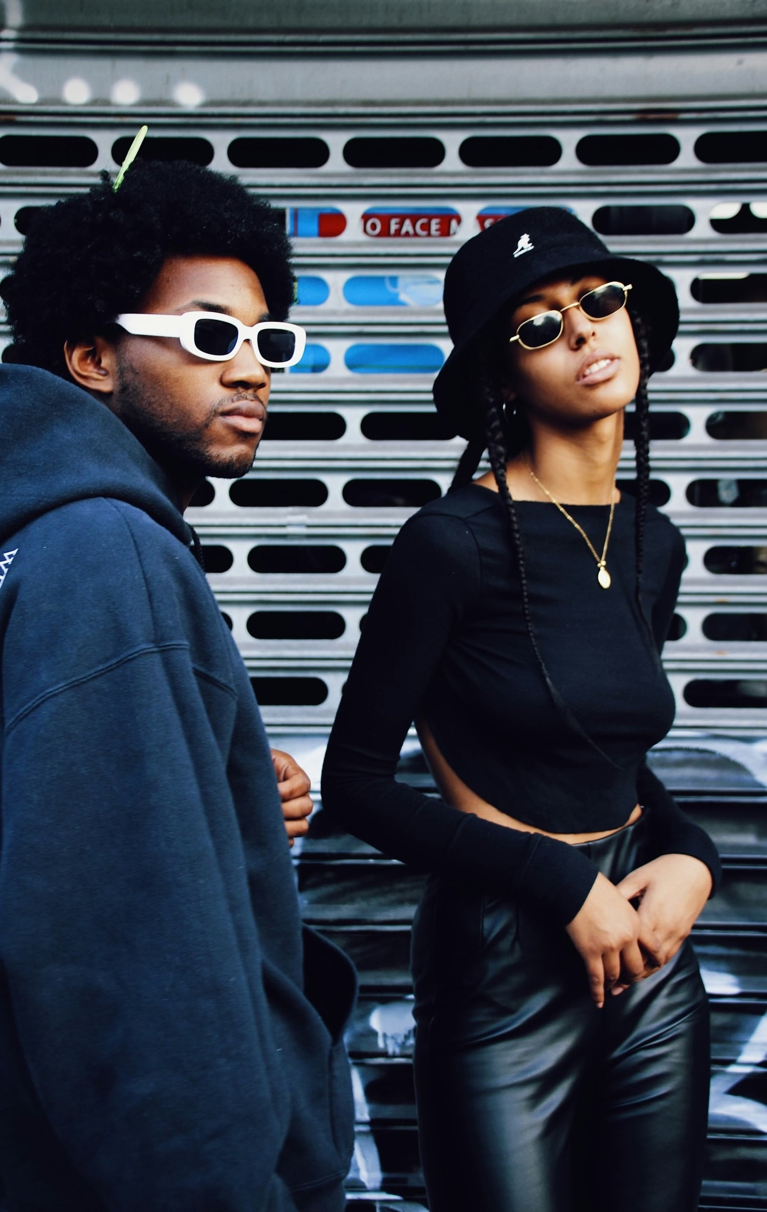 black man and woman wearing all black