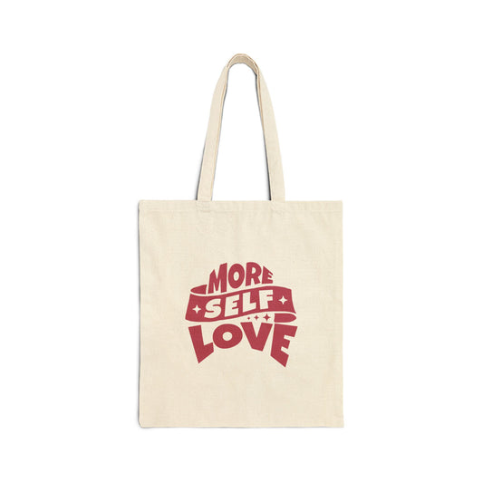 tan tote bag with pink letters.