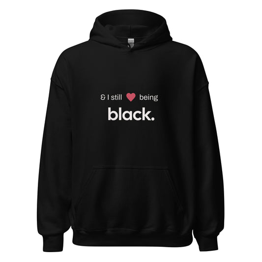 Black hoodie with black empowerment phrase on it in white font and a red heart.